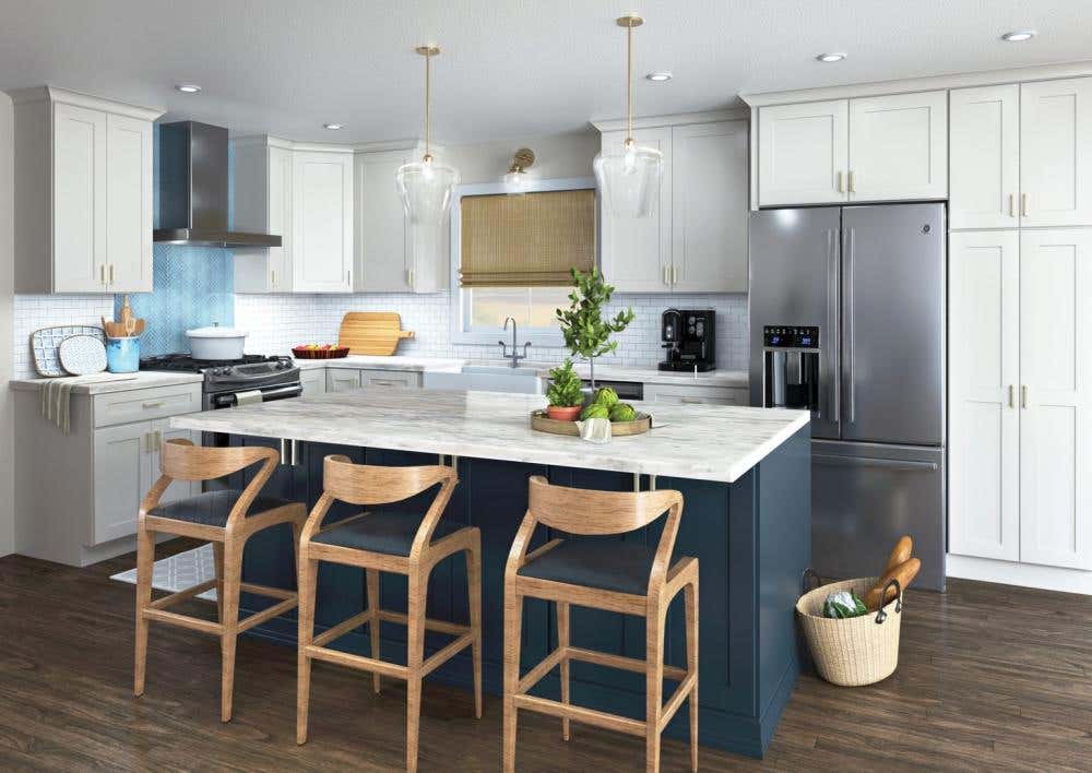 Shaker white kitchen cabinets with a navy blue island and warm wood accents