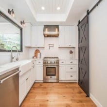 Bold Barn Door in a Bright Kitchen