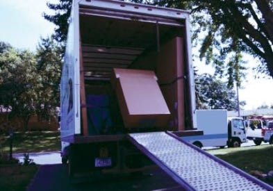 Box truck making kitchen cabinet delivery