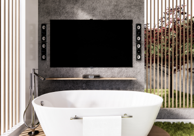 Luxury bathroom remodel with free-standing tub and focal wall with a TV