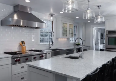 Stainless and glass  with timeless white shaker cabinets for a new take on farmhouse style.