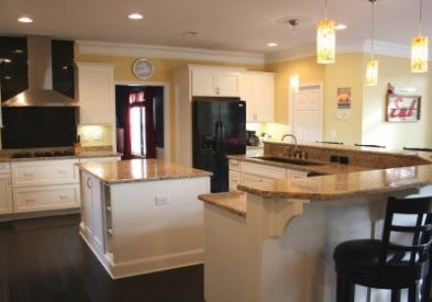 Fort Mill, South Carolina kitchen renovation features CliqStudios Shaker Painted White cabinets and a new layout that is sunny and spacious.