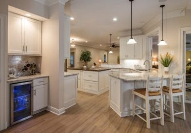 See photos of this stunning kitchen renovation in Monroe, Connecticut with an open layout featuring Shaker Painted White cabinets and butlers pantry.