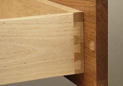 Corner view of a solid wood dovetail drawer