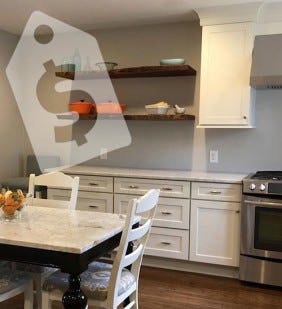 White Remodeled Kitchen with Price Tag Graphic