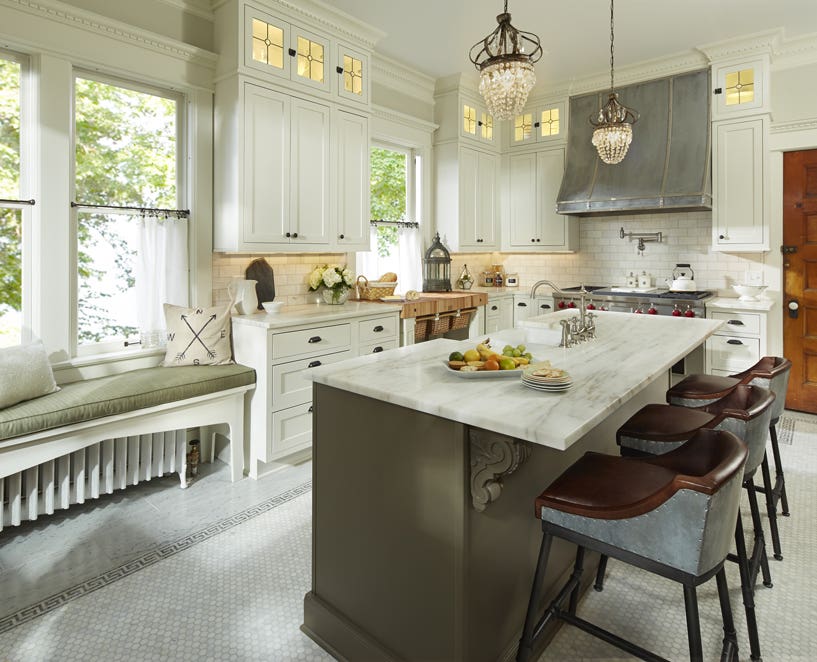  CliqStudios after photo of a white shaker inset kitchen design with an olive-green island and marble countertops.