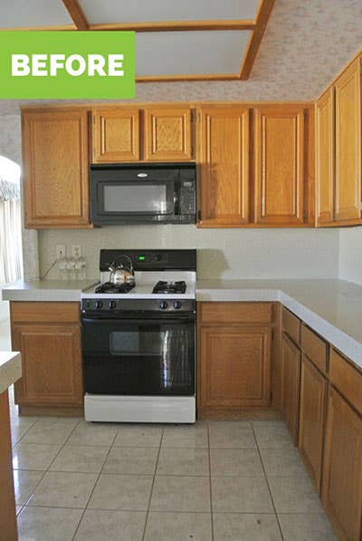 Oak builder grade cabinets and appliances before remodel