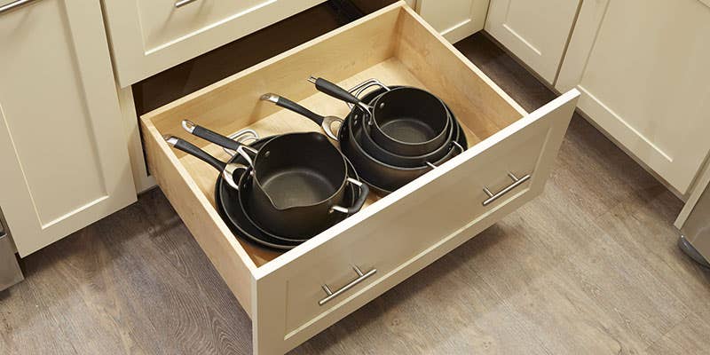CliqStudios dayton style pots and pans deep drawer Painted Linen cabinet with stacked cookware