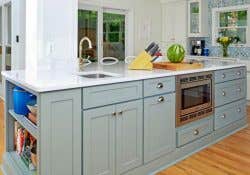 large kitchen island finished in Harbor with a white countertop