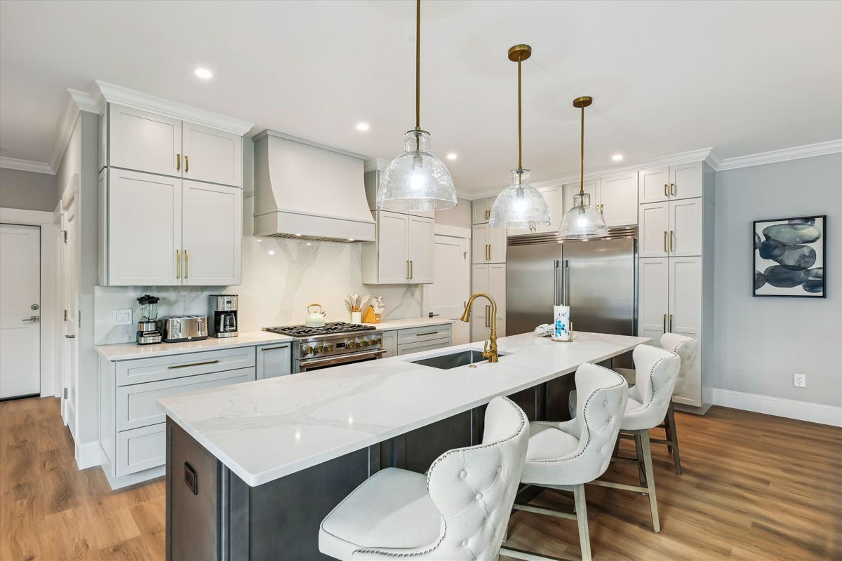 Transitional Two-Tone Kitchen Remodel With Furniture Elements