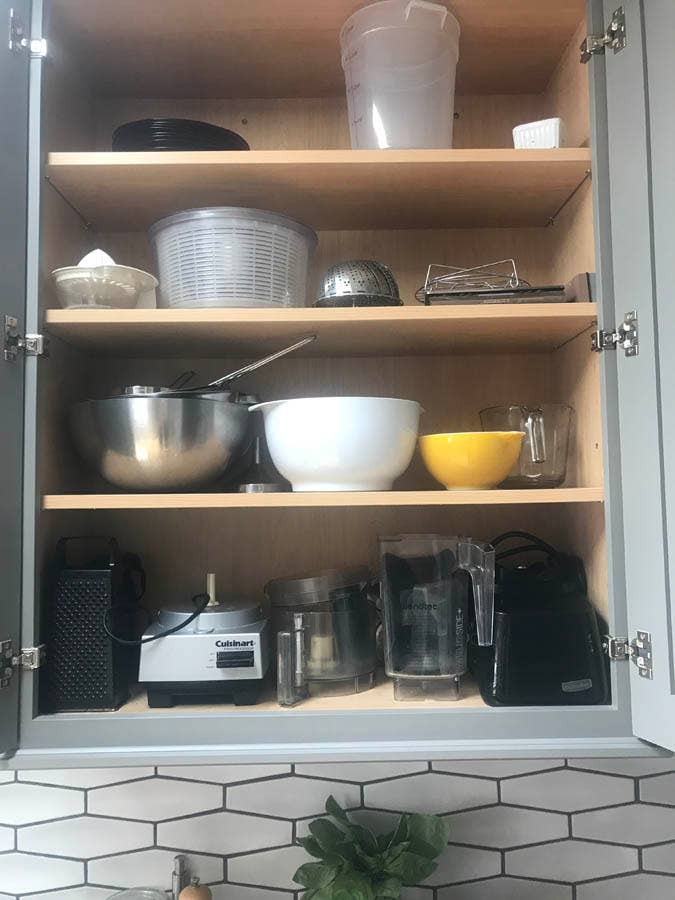 cooking and baking items stored in upper cabinets. cooking and baking items stored in upper cabinets.