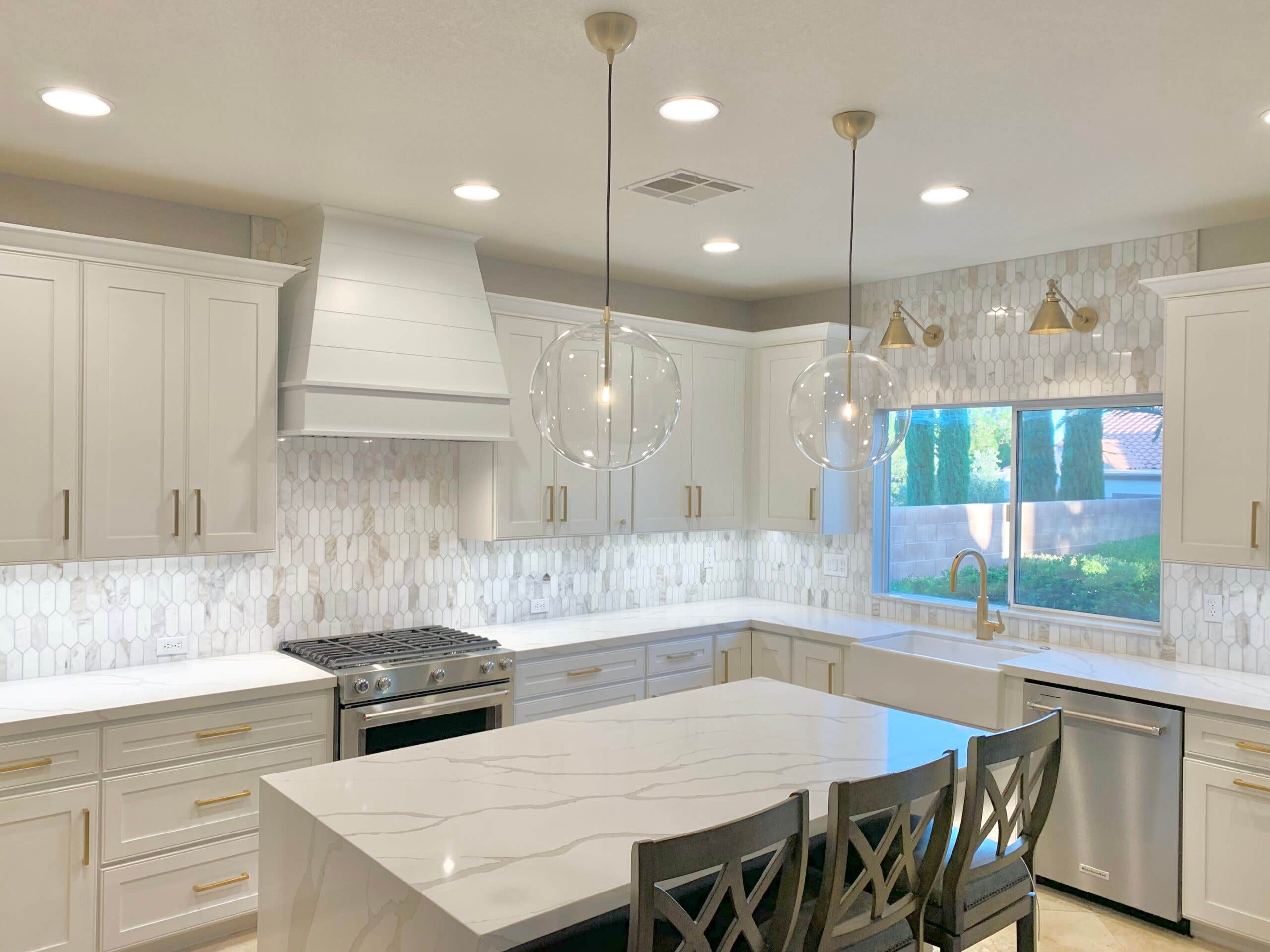 White tapered with shiplap wood range hood in white shaker kitchen White tapered with shiplap wood range hood in white shaker kitchen