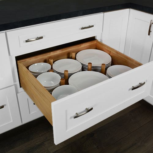 Pegboard deep drawer organizer in middle of three drawer shaker white cabinet Pegboard deep drawer organizer in middle of three drawer shaker white cabinet