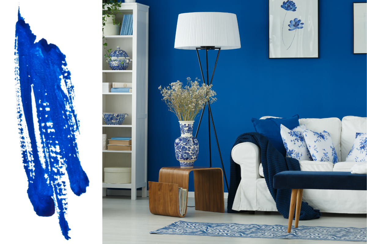 Ultra bright marine blue paint finish in living room with white and light wood furniture Ultra bright marine blue paint finish in living room with white and light wood furniture