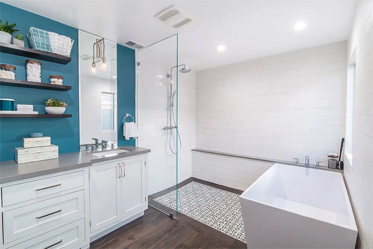 CliqStudios bath cabinets shown in Shaker White door style and finish