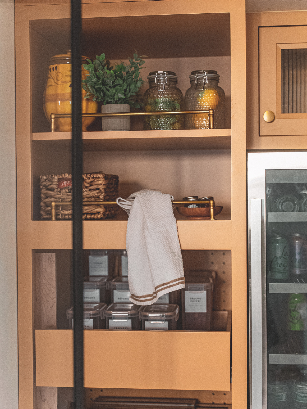 Kitchen pantry cabinets in yellow inset kitchen cabinets with reeded glass and natural stone countertop Kitchen pantry cabinets in yellow inset kitchen cabinets with reeded glass and natural stone countertop