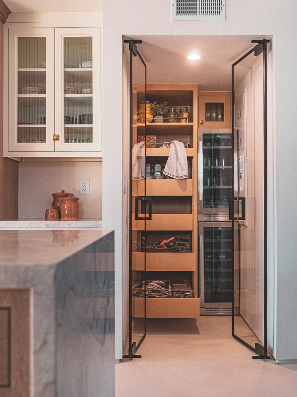 Kitchen pantry cabinets in yellow inset kitchen cabinets with reeded glass and natural stone countertop Kitchen pantry cabinets in yellow inset kitchen cabinets with reeded glass and natural stone countertop