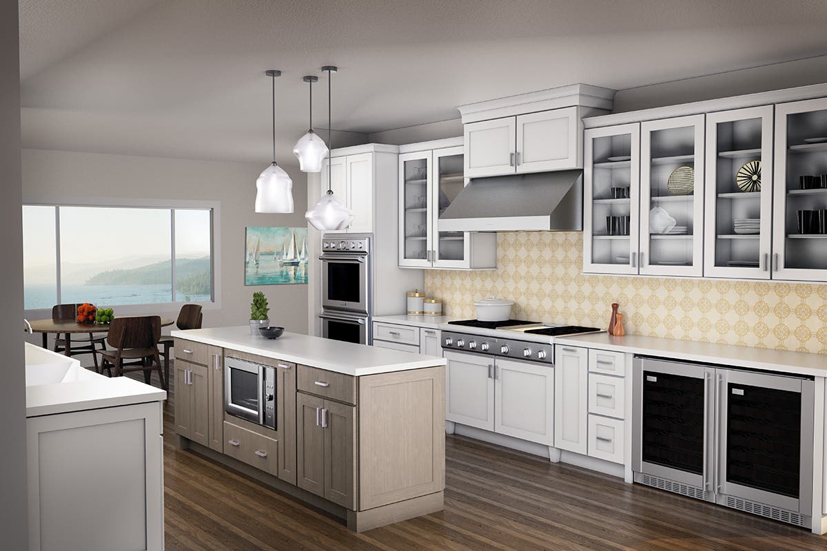 Large white shaker style galley kitchen with light brown island, chef's kitchen appliances and glass wall cabinets