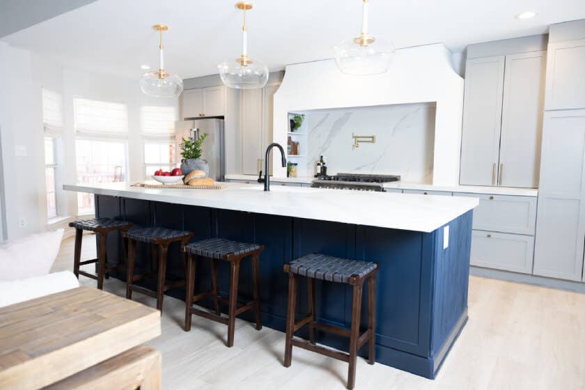 Duluth-Pebble-and-Cobalt.jpg Elevated gray shaker kitchen design with large navy blue kitchen island and white quartz countertops