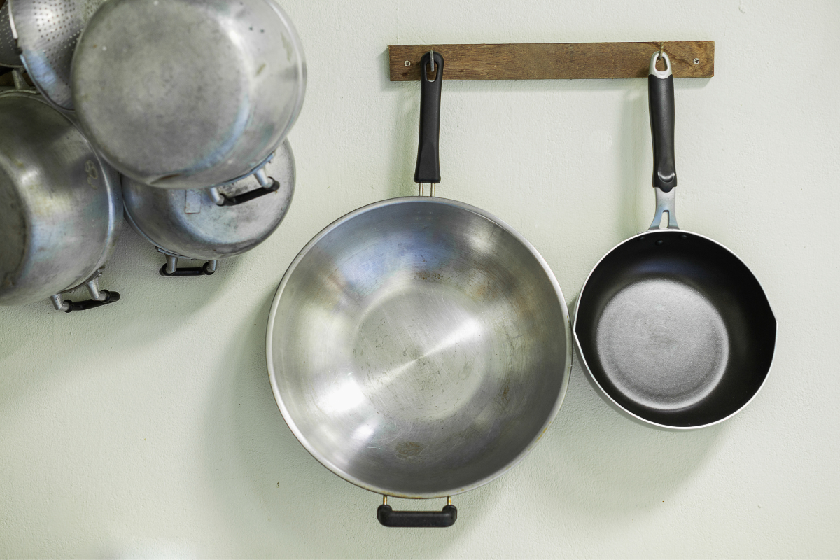 Wall-mounted pots and pans racks for storage