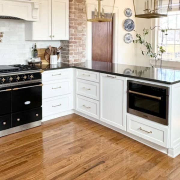 White shaker farmhouse kitchen design White shaker kitchen with built-in microwave