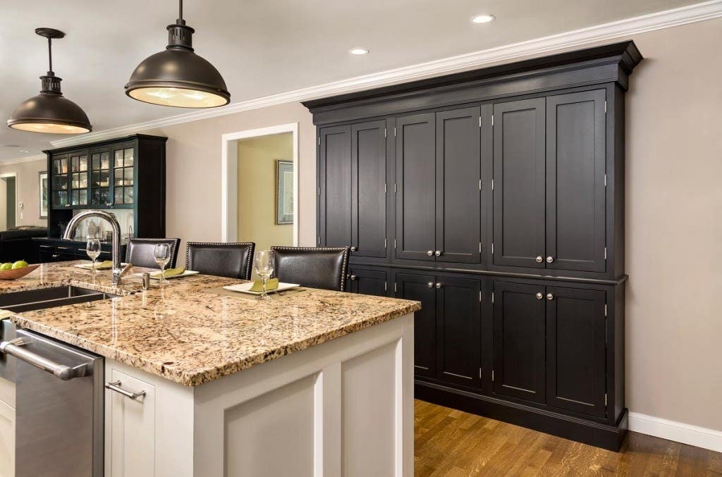 Kitchen with Shaker door Shaker Inset-style cabinets in painted White with a tall built-in hutch in Shaker Inset painted Black