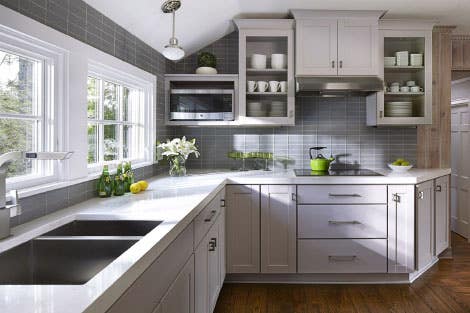 Classic line's affordable cabinets shown in Shaker style Hartford Clay