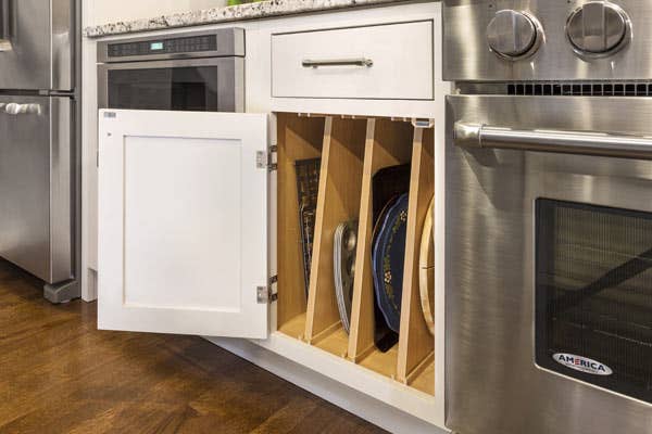 Tray divider installed in CliqStudios Shaker Inset base cabinet in White. Tray divider installed in CliqStudios Shaker Inset base cabinet in White.