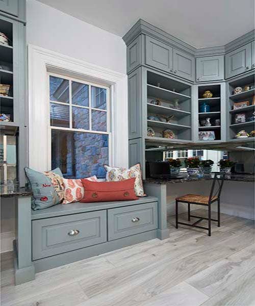 Custom drawer bench window seating in CliqStudios Decorative style painted in Blue-Gray.