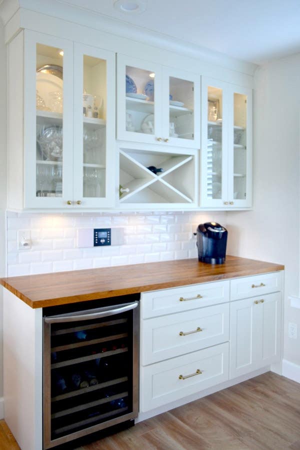 CliqStudios Shaker cabinets in White used in a butler's pantry, complete with a wine cooler and rack, a butcher block counter, and glass cabinets. CliqStudios Shaker cabinets in White used in a butler's pantry, complete with a wine cooler and rack, a butcher block counter, and glass cabinets.