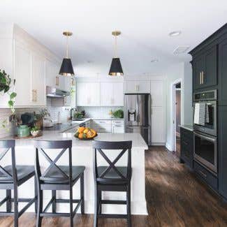 Black and white kitchen with shaker with large pantry wall