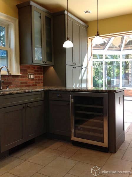 Shaker Kitchen Cabinets in Green peninsula