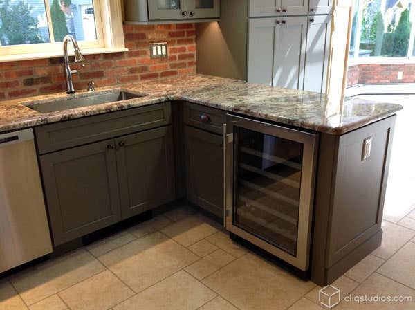 Shaker Green Kitchen Cabinets in Green Peninsula