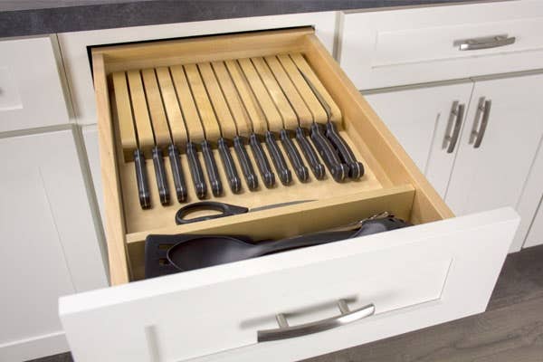 Full knife block drawer painted white. Full knife block drawer painted white.