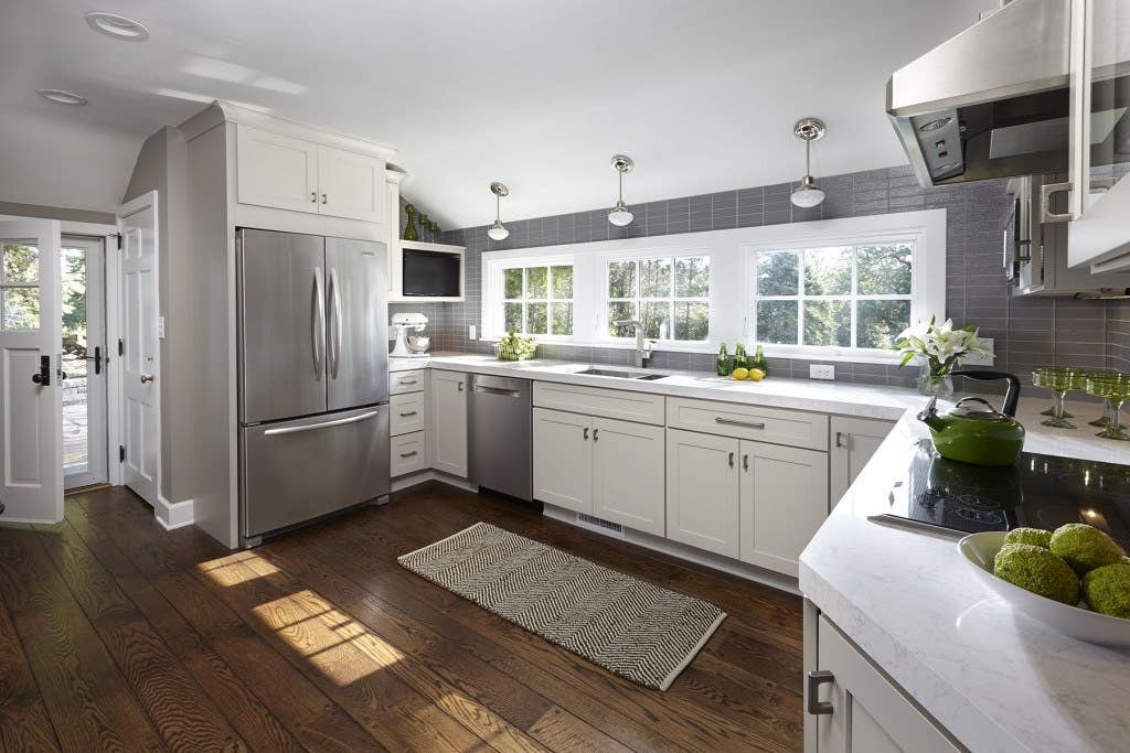 Modern gray kitchen featuring CliqStudios Shaker cabinet style in Painted Light gray.