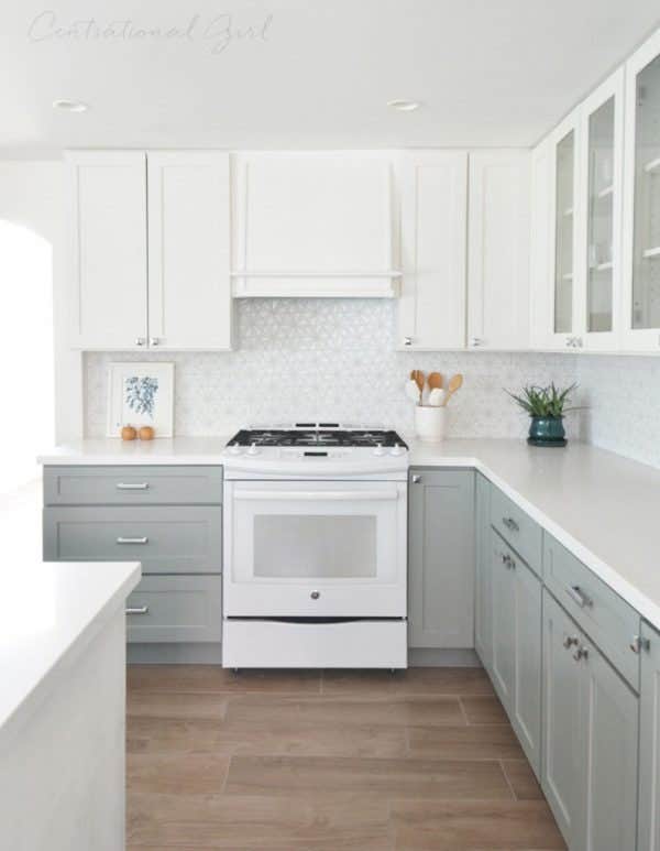 White and light gray kitchen cabinets with white countertops