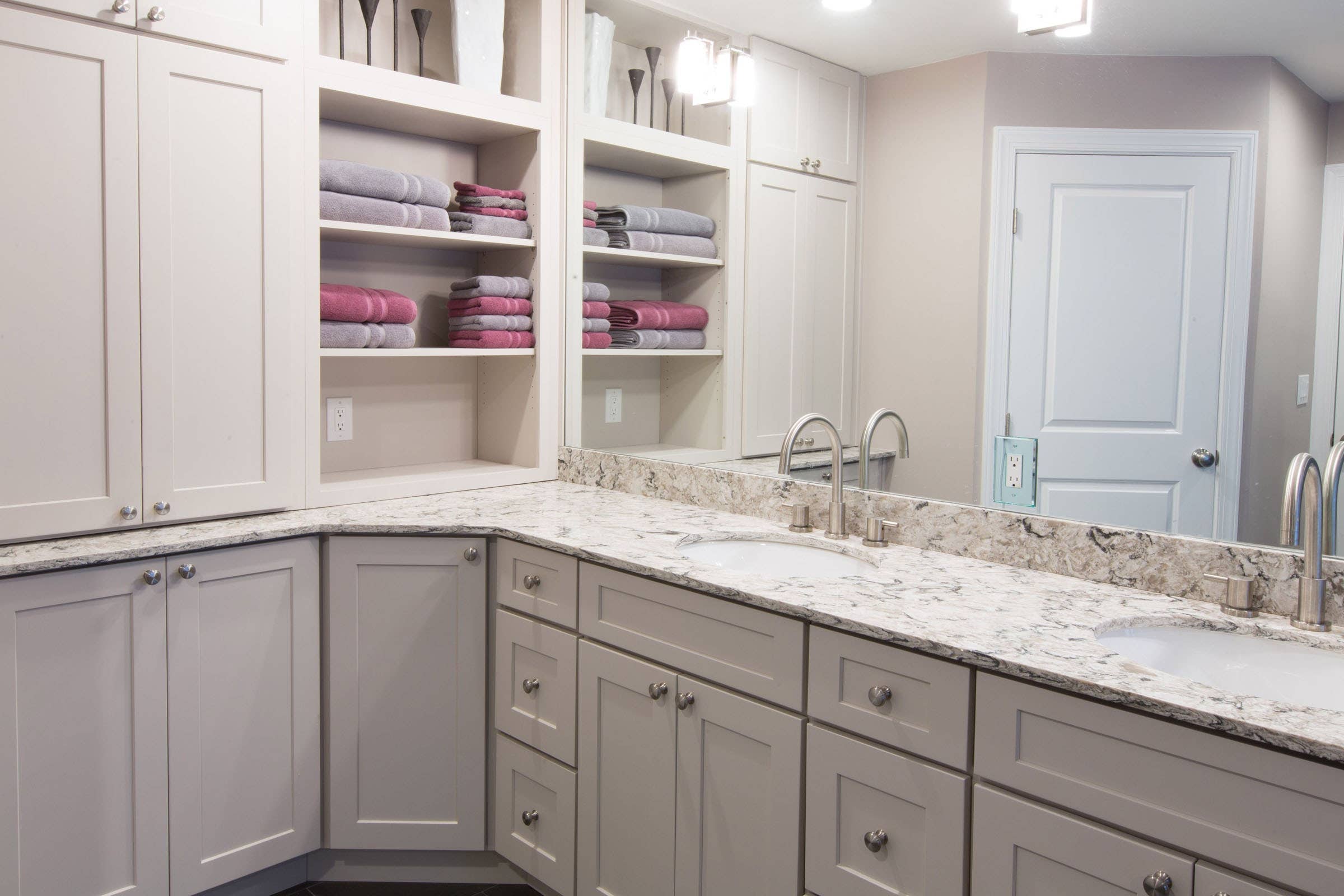 CliqStudios bath cabinets shown in Shaker White door style and finish