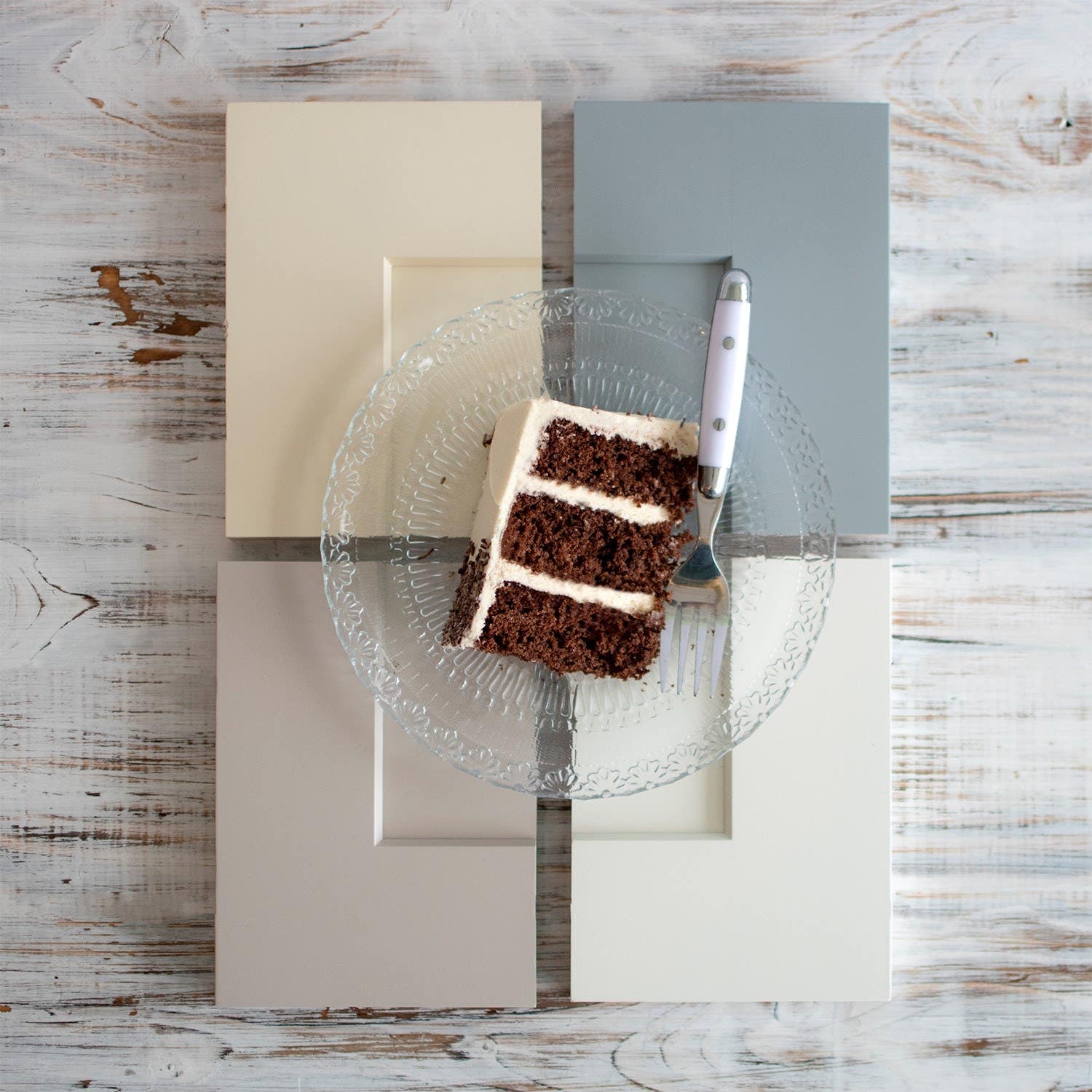 Four pastel colored cabinet corner samples with a piece of Dessert'd cake on top Four pastel colored cabinet corner samples with a piece of Dessert'd cake on top