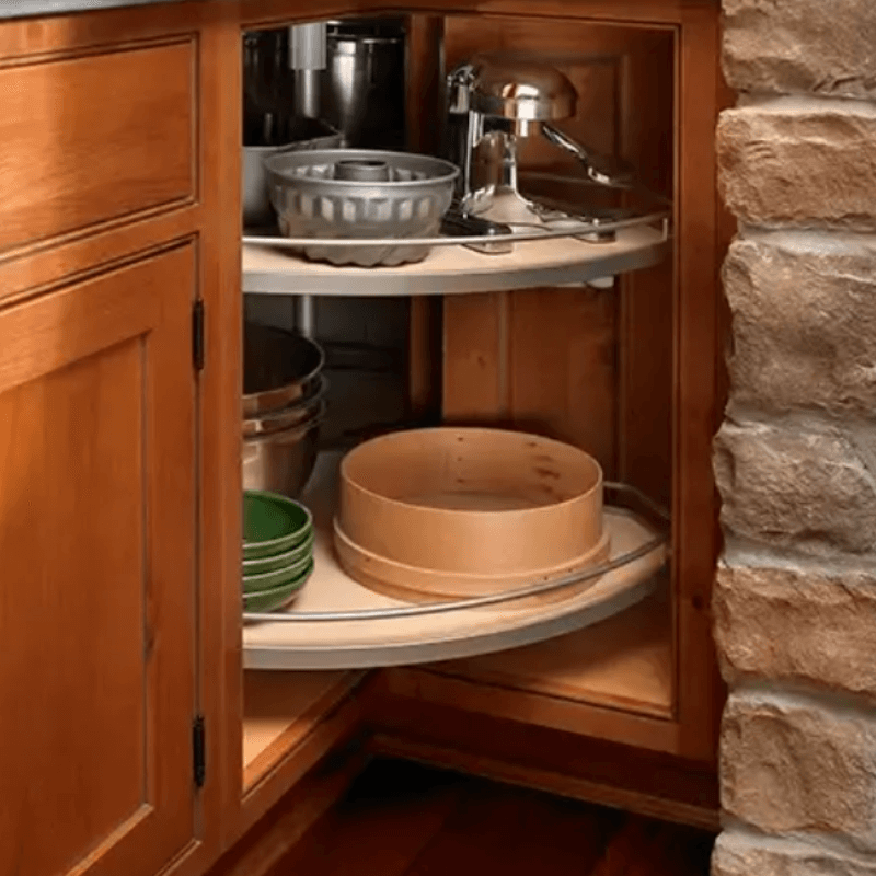 Lazy Susan Storage Lazy susan storage with two wood spinning trays and metal rails.