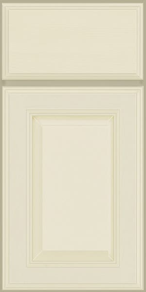 Raised panel cabinet door in cream colored paint