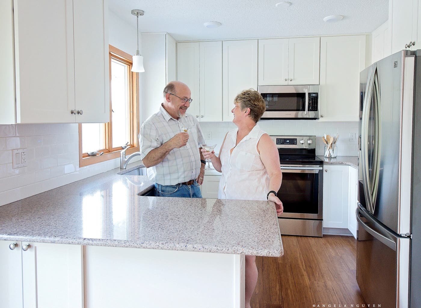 paul and sheryl in their new white kitchen paul and sheryl in their new white kitchen