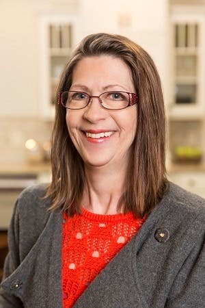 smiling woman wearing glasses smiling woman wearing glasses
