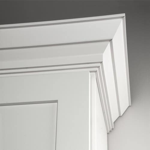 Traditional crown molding painted White at top corner of a wall cabinet Traditional crown molding painted White at top corner of a wall cabinet