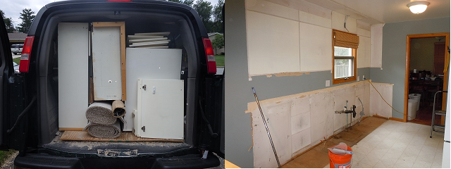 used white cabinets in back of van and kitchen with cabinets torn out ready for new cabinets and appliances